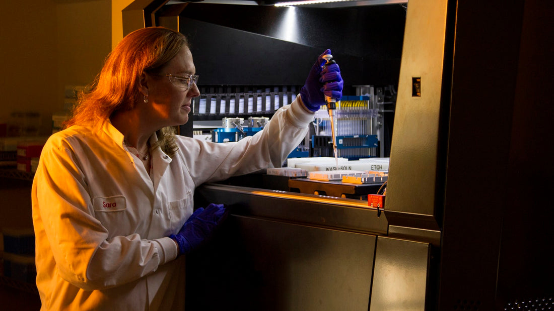 Scientist reviewing analytical lab results and documentation